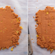 There's two photos side by side. In the first photo, the rolled out filling in a rough square. In the second photo, slices have been made evenly across the mixture. These slices match the proportions and dimensions of our mold. They will be separated and made into our candy bar filling.